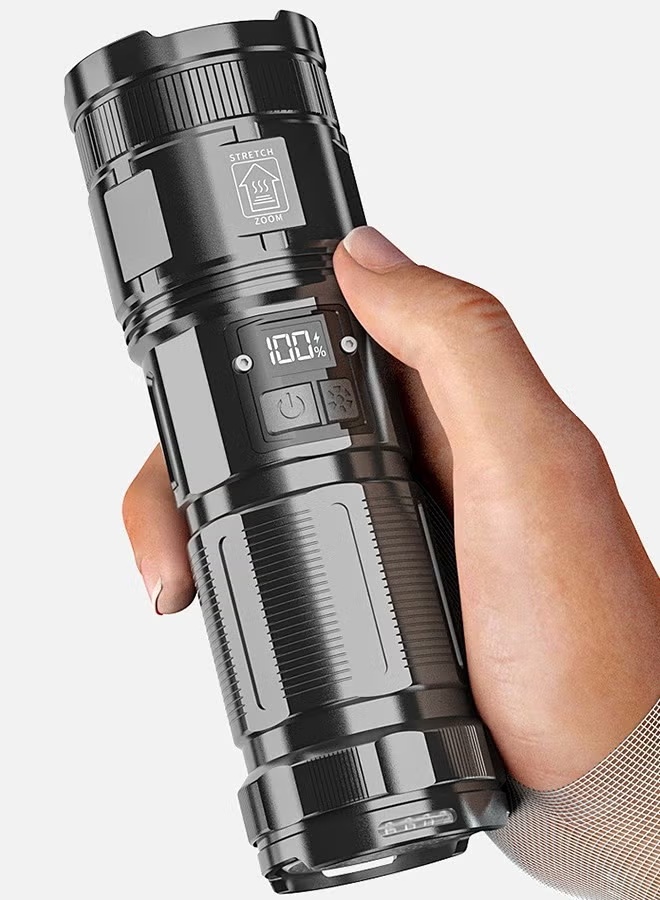 FL-M60 held in one hand showing its grip, controls and battery display